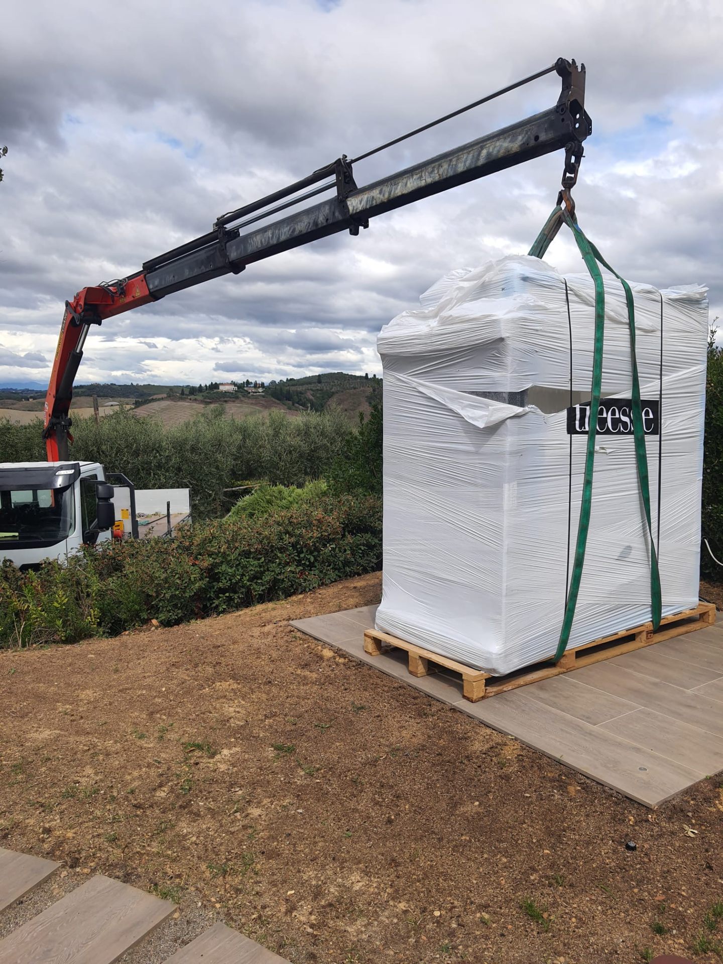 Movimentazione con gru di big bag su pallet